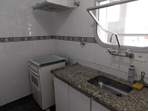 Fridge, microwave, oven, stovetop - Wonderful Apartment on Enseada Beach! (Guarujá)