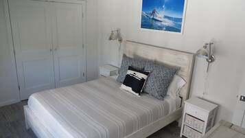 2 bedrooms, desk, iron/ironing board, travel crib