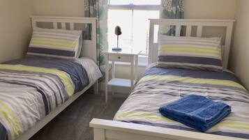 2 bedrooms, iron/ironing board, WiFi, bed sheets
