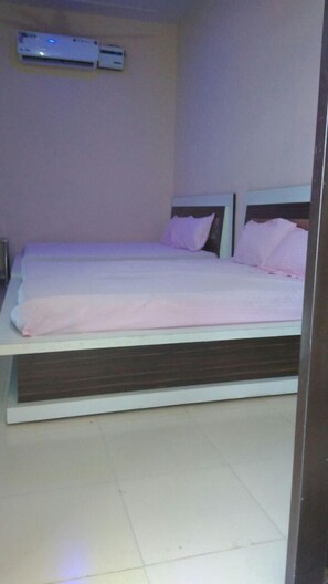 Standard Air Cool Family Room, Shared Bathroom | Down comforters, individually decorated, rollaway beds - Hotel The Atulyam (Nohar)
