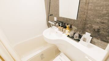 Free toiletries, hair dryer, slippers, electronic bidet