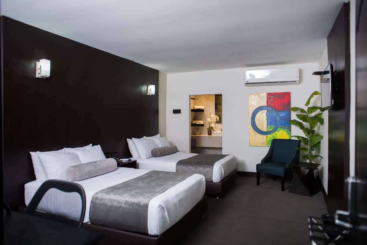 Premium bedding, desk, laptop workspace, blackout curtains