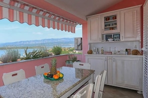 Outdoor dining - Apartment Klimno View Point (49852-A1) (Klimno - island Krk)
