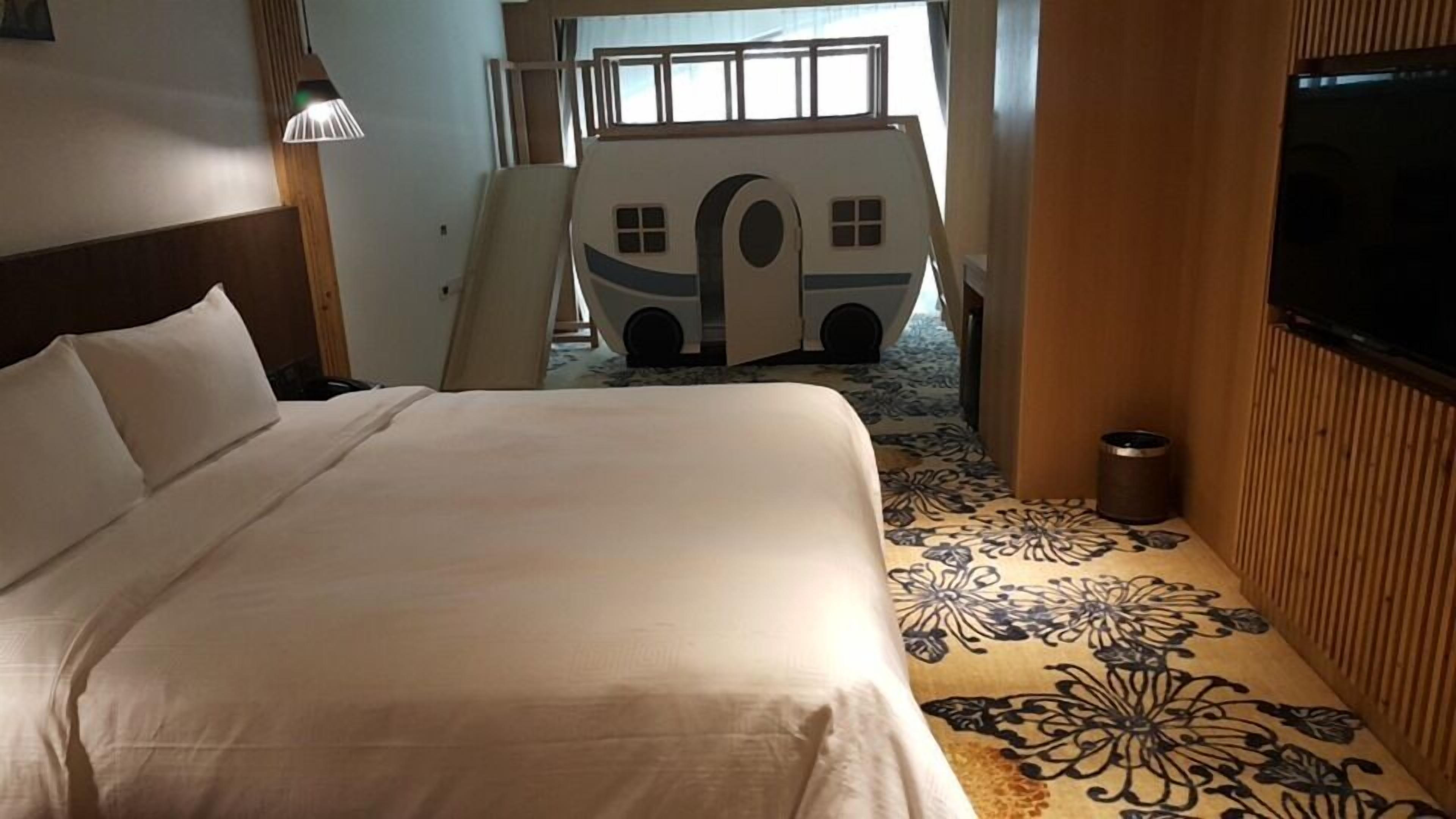 family room, multiple beds | in-room safe, desk, blackout curtains, soundproofing