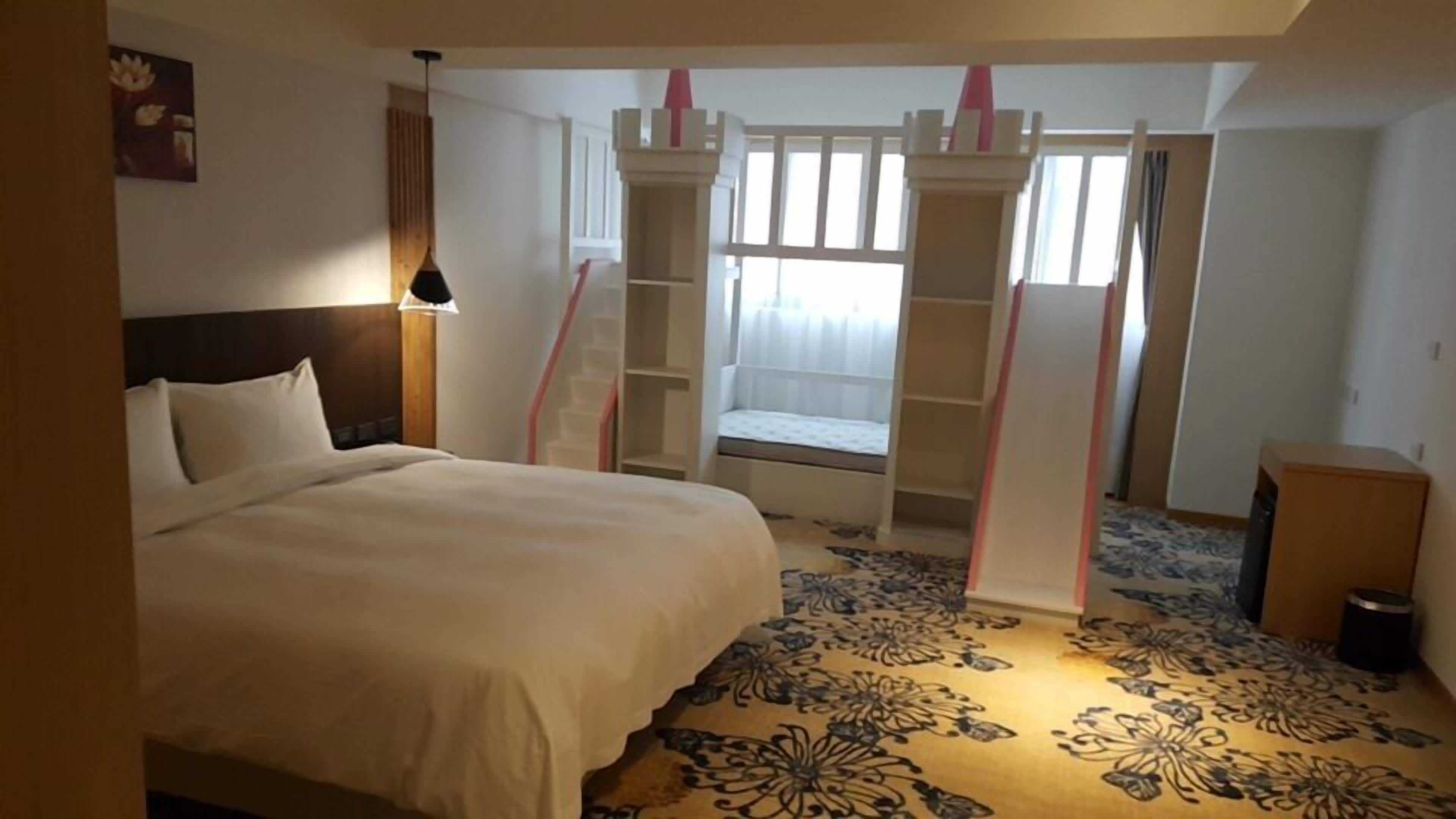 family room, multiple beds | in-room safe, desk, blackout curtains, soundproofing