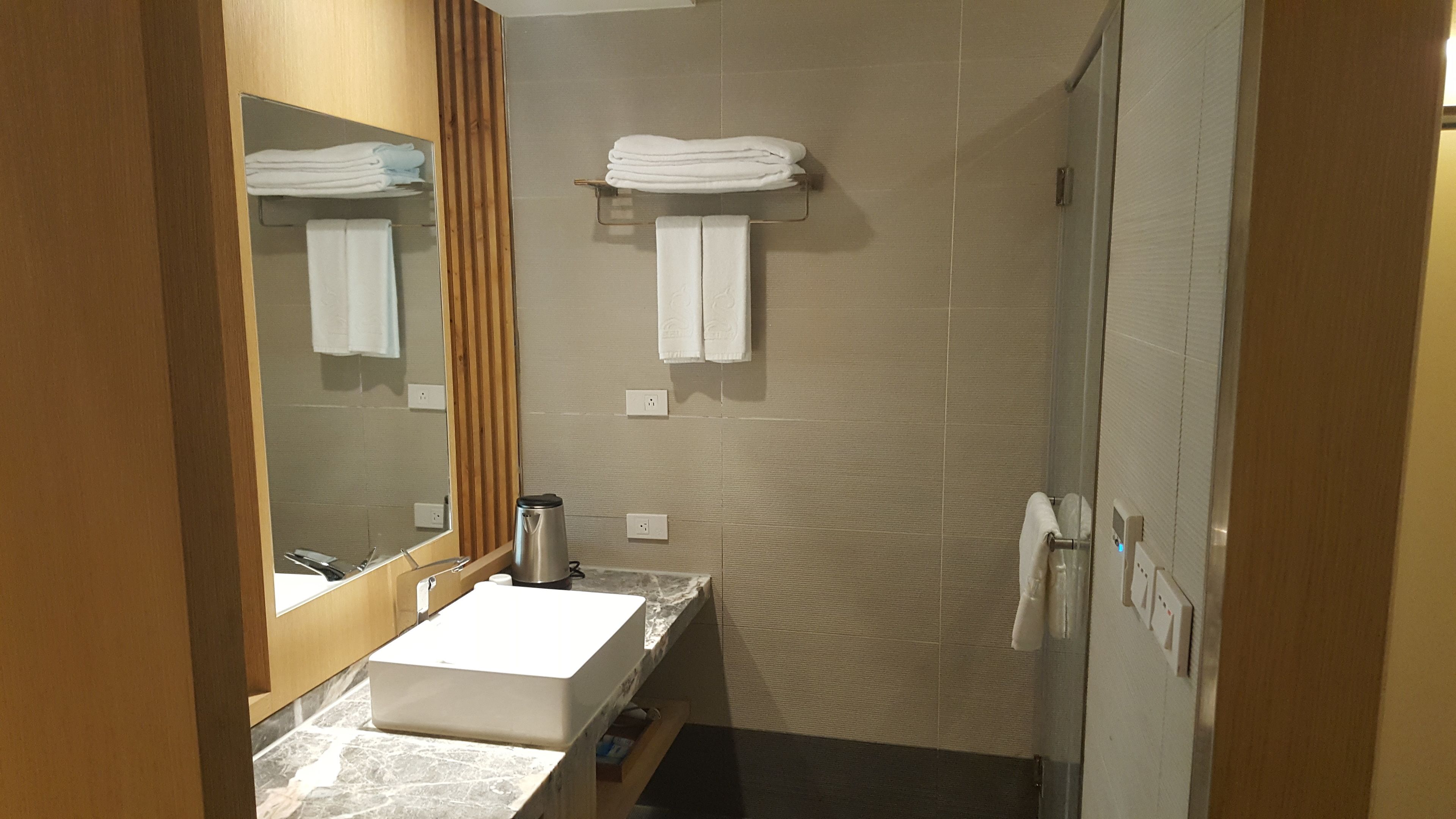 shower, rainfall showerhead, hair dryer, slippers