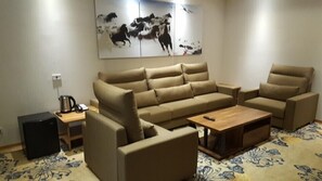 Exclusive-dobbeltværelse - 1 soveværelse | Opholdsområde | Tv