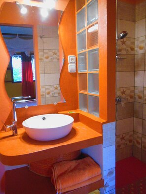 Shower, rainfall showerhead, towels, soap