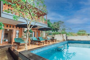 Outdoor pool, sun loungers