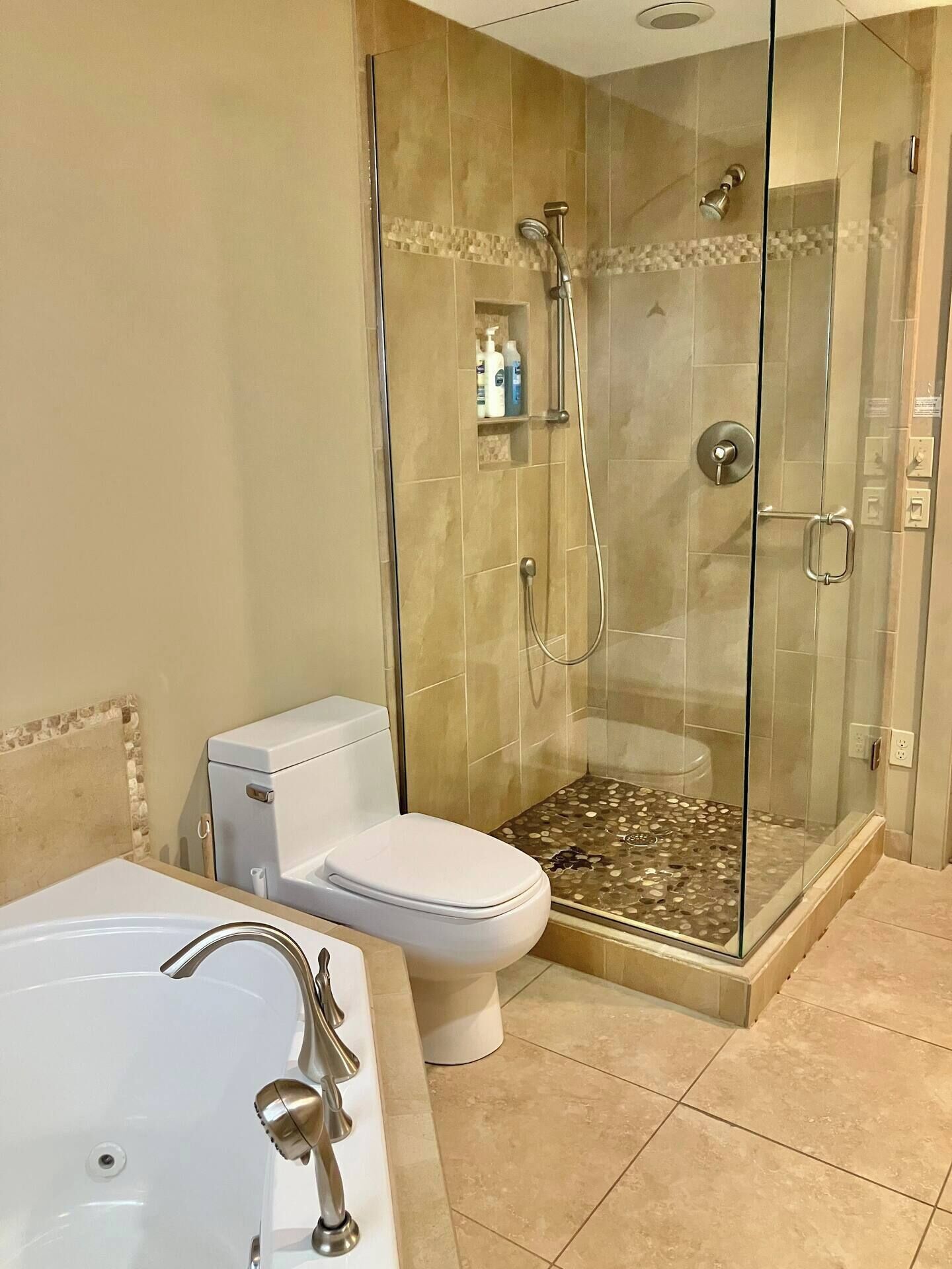 Bathtub, hair dryer, towels, soap