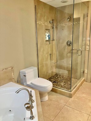 Bathtub, hair dryer, towels, soap