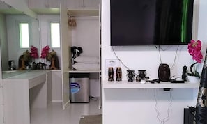 Fer et planche à repasser, draps fournis