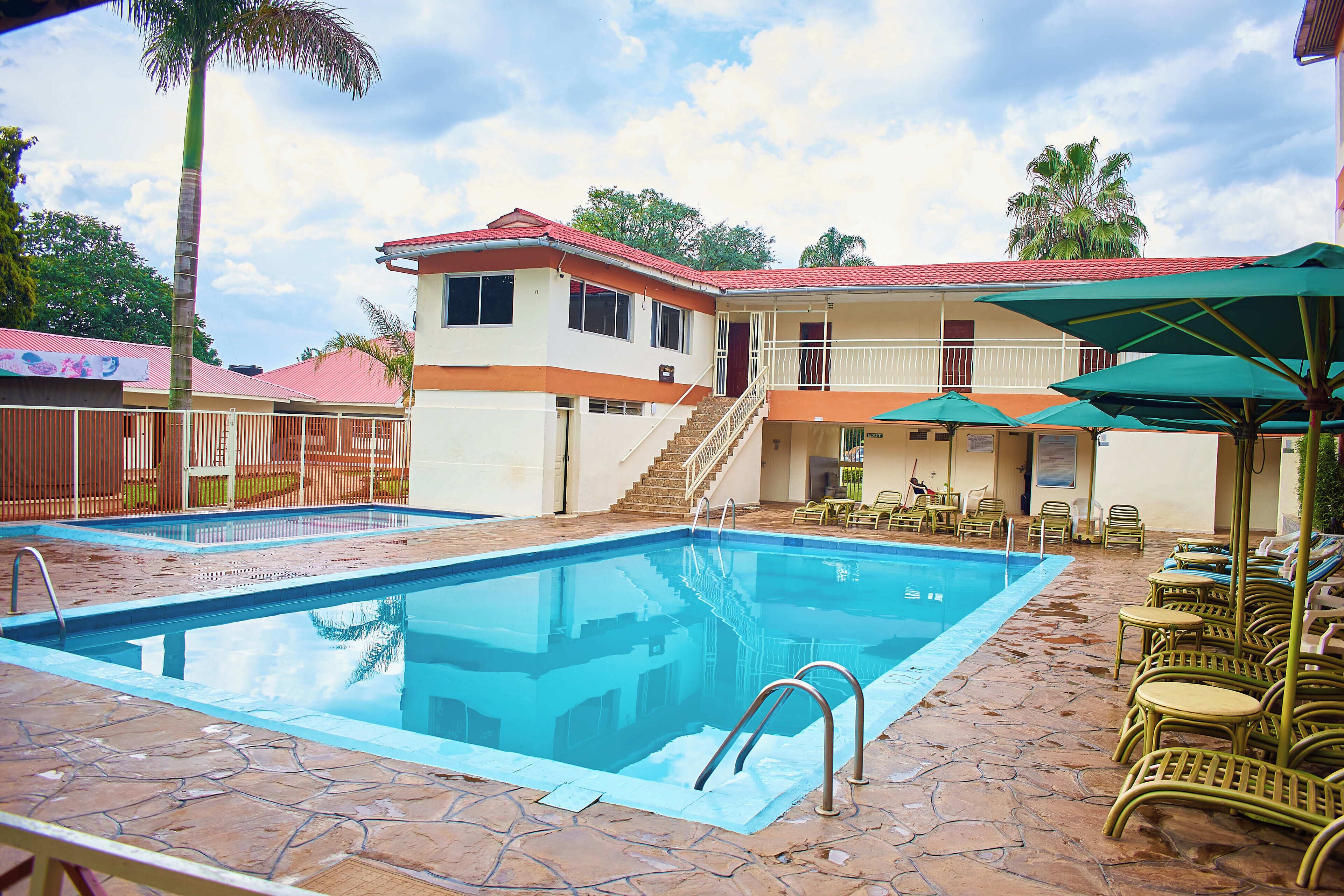 Outdoor pool, pool umbrellas, sun loungers