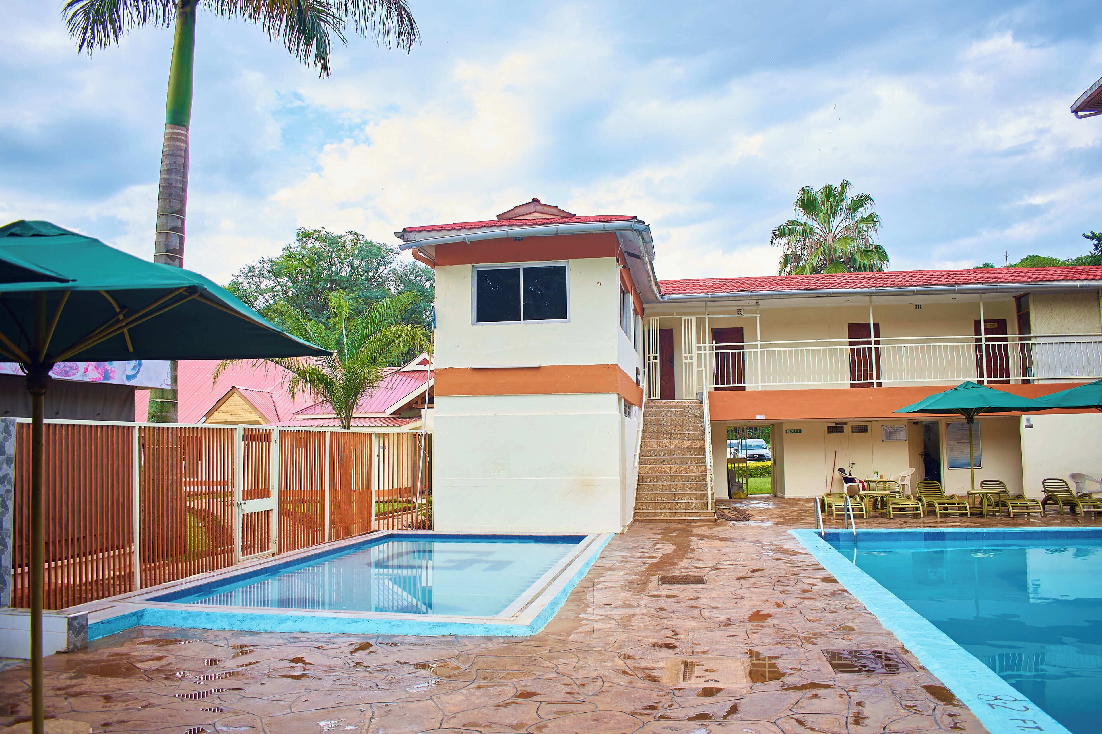 Outdoor pool, pool umbrellas, sun loungers