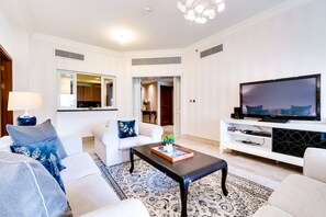 Family Apartment, City View | Living area | 55-inch LED TV with digital channels, TV, Netflix - Fairmont North Luxury 2 BR Apt Palm (Dubai)