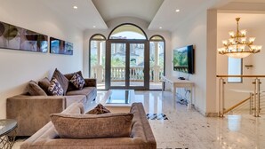 Luxury Villa, Beach View | Living area | Flat-screen TV - Six BDR Villa Palm Tropic Palm Jumeirah (Dubai)