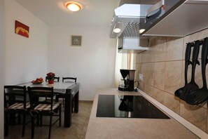 Fridge, coffee/tea maker, cookware/dishes/utensils, dining tables - Apartment Tomislav (Silo - island Krk)
