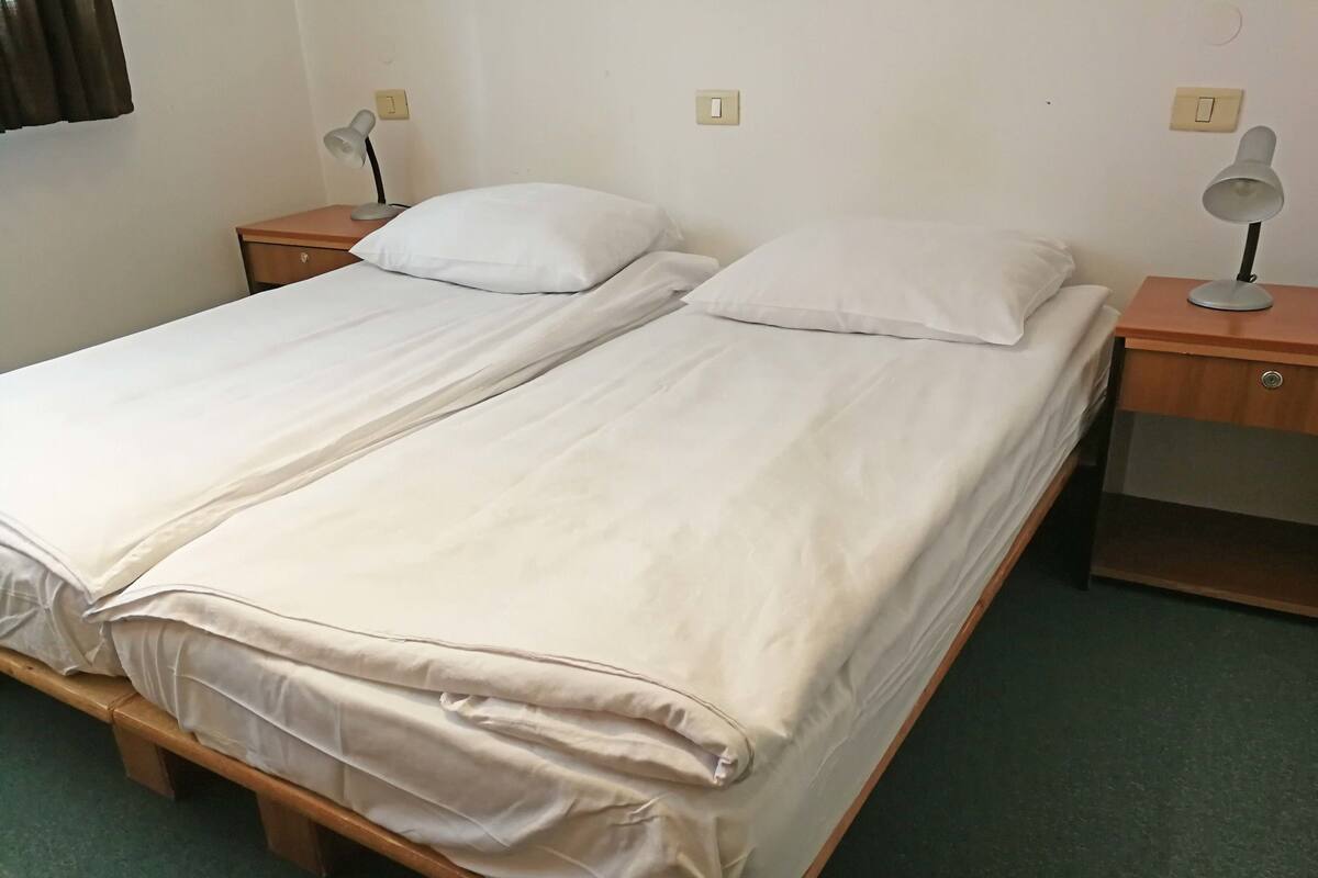 Desk, free WiFi, bed sheets