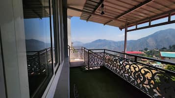 Deluxe Suite, 2 Bedrooms | Balcony view