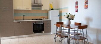GuestHost - Cosy 100 sqm apartment, organized on two levels (ground and first floor), perfect for 5 people located 500m far from the sea and the beautiful beaches, has a large balcony with outdoor table, perfect for lunch and breakfast outside enjoying t