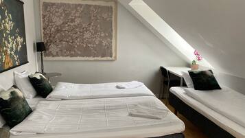 Blackout curtains, soundproofing, iron/ironing board, cots/infant beds