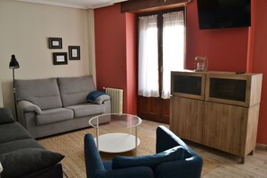 Family Apartment, 3 Bedrooms, Mountain View | Living area | Flat-screen TV - Tres Puentes Anguiano (Anguiano)