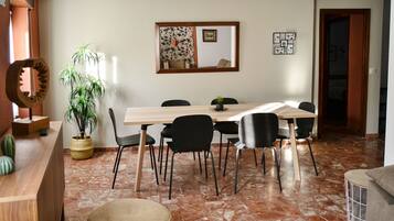 Family Apartment, 3 Bedrooms | Living room | Flat-screen TV