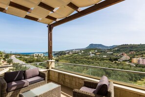 Villa, plusieurs lits | Balcon