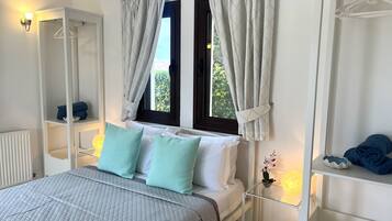 4 chambres, coffres-forts dans les chambres, fer et planche Ă repasser