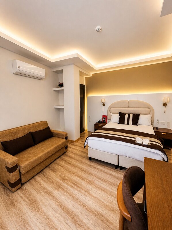 Standard Triple Room | Coffre-fort, espace de travail pour ordinateurs portables
