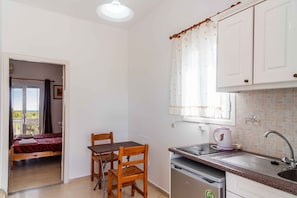 Double Room, Balcony | Private kitchen | Full-size fridge, stovetop, coffee/tea maker, electric kettle - Pink House Socrates (Corfu)