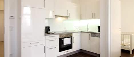 Superior Apartment | Private kitchen | Full-size fridge, stovetop, dishwasher, espresso maker