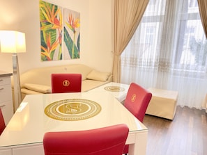 Superior Apartment | Living area | 40-inch flat-screen TV with satellite channels, Smart TV, Netflix - Steiner Residences Vienna Augarten (Vienna)