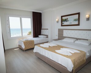 Junior Quadruple Room, Sea View | Minibar, desk, free cribs/infant beds, rollaway beds - Seymen Hotel (Erdemli)