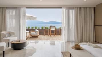 Quarto, 1 cama King, vista para o mar | Frigobar, cofres nos quartos, individualmente decorados, escrivaninha