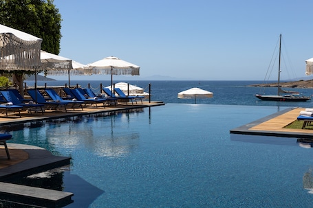 Seasonal outdoor pool, open 7:00 AM to 7:00 PM, pool umbrellas. METT Hotel & Beach Resort Bodrum