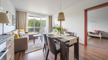 Apartment (Spacerowa 21/35) | Living area | Flat-screen TV