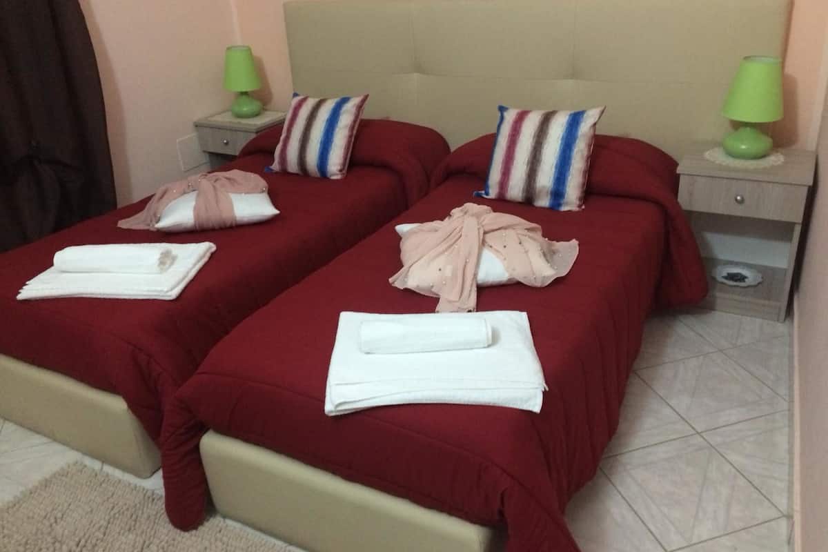 Double or Twin Room, Courtyard View | Desk, cribs (surcharge), rollaway beds (surcharge), WiFi (free)
