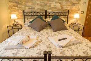 Kamer, 1 twee- of 2 eenpersoonsbedden (Verde) | Een minibar, individueel gedecoreerd, individueel gemeubileerd