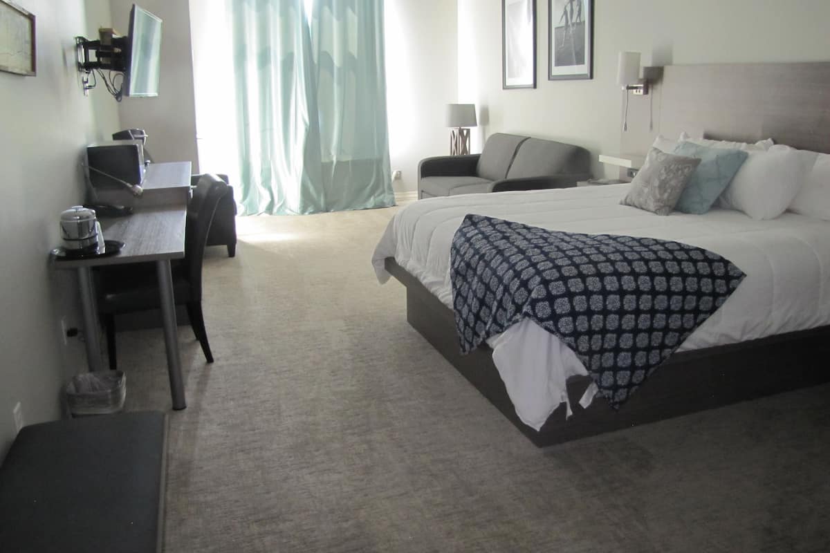 Standaard suite, 1 kingsize bed met slaapbank, niet-roken | Luxe beddengoed, pillowtop-bedden, een bureau, verduisterende gordijnen
