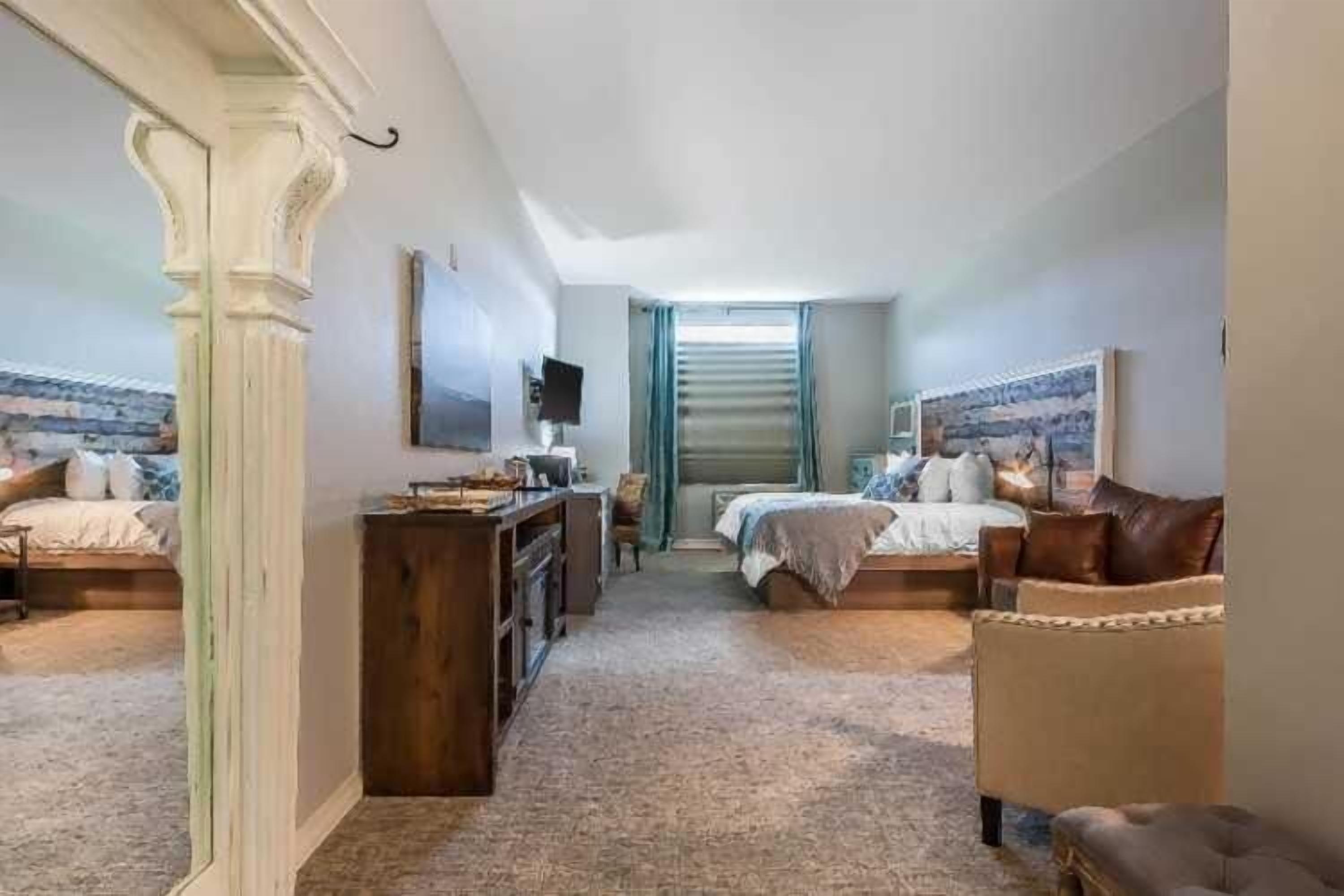 premium bedding, pillow-top beds, desk, blackout curtains