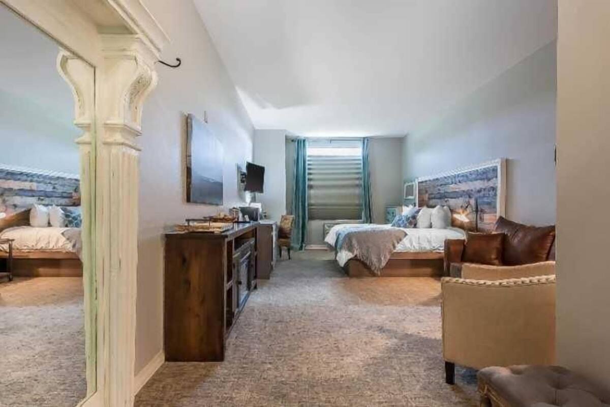 premium bedding, pillow-top beds, desk, blackout curtains