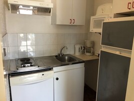 Fridge, microwave, stovetop, coffee/tea maker