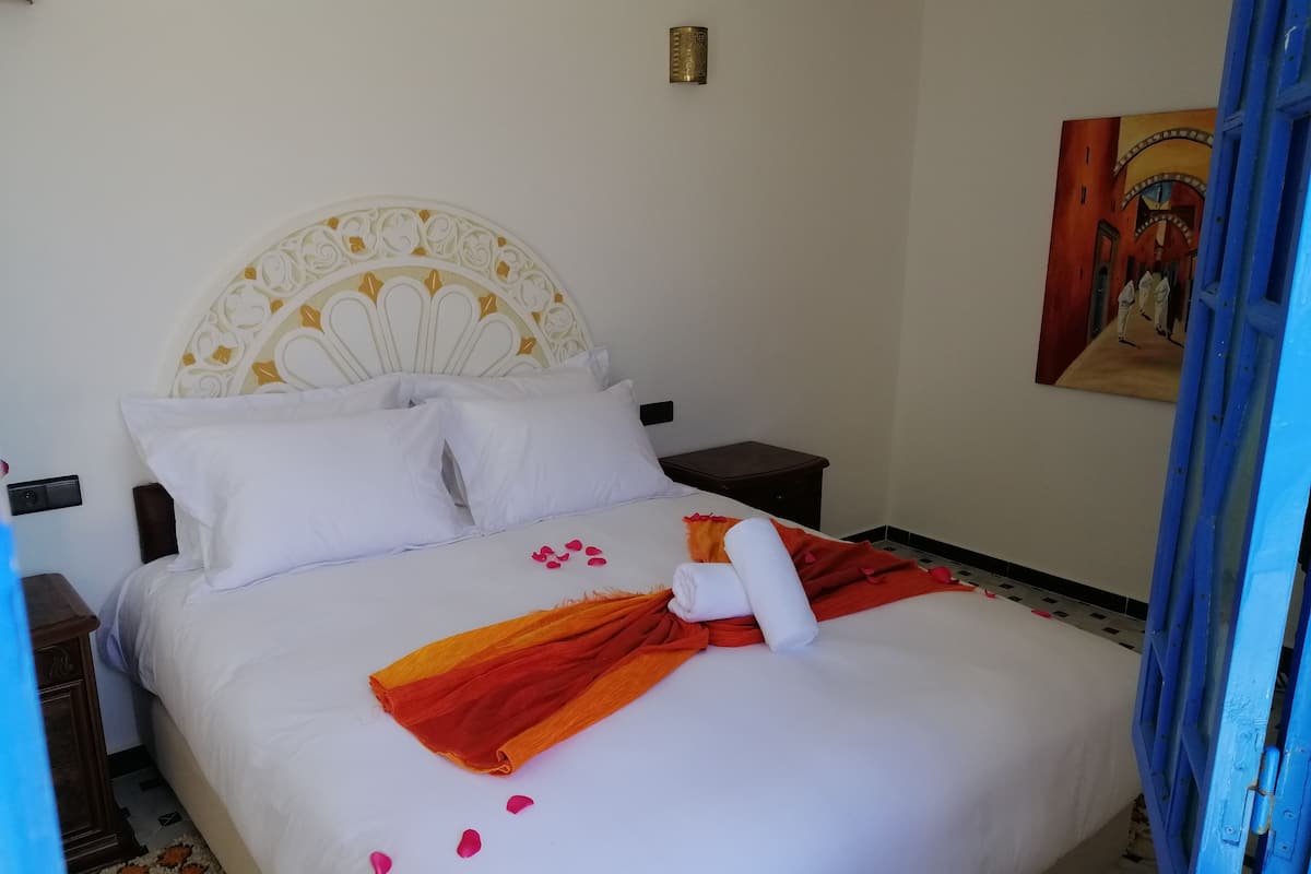 Suite Familiale, vue mer | Coffres-forts dans les chambres, rideaux occultants