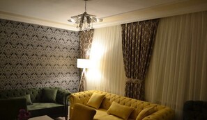 Familie appartement, 2 slaapkamers | Woonruimte | Een lcd-televisie