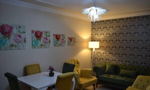 Familie appartement, 2 slaapkamers | Woonruimte | Een lcd-televisie