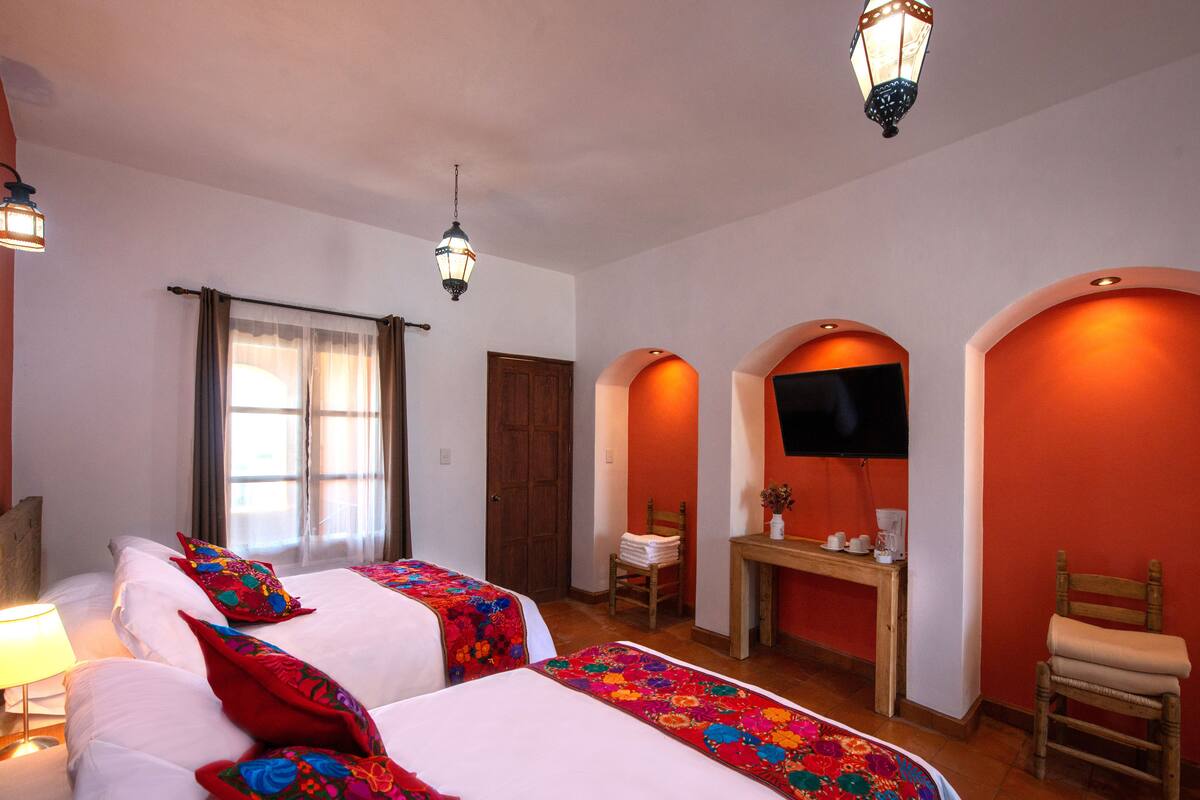 Design Quadruple Room, Mountain View | Premium bedding, down duvets, desk, laptop workspace
