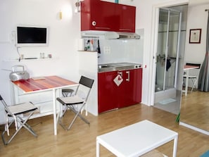 Fridge, microwave, cookware/dishes/utensils