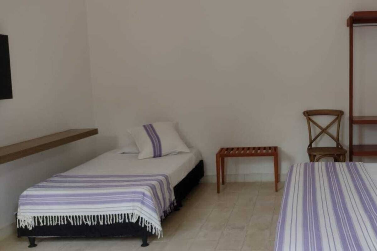 Triple Room | Blackout drapes, iron/ironing board (on request), WiFi (free)