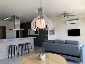 Exclusive Apartment | Living area | 32-inch TV with cable channels - Luxury 2 Bedroom Apartments (Cancun)